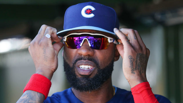 CHICAGO, ILLINOIS - JUNE 17: Jason Heyward #22 of the Chicago Cubs adjusts his sunglasses during the 7th inning at Wrigley Field on June 17, 2022 in Chicago, Illinois.