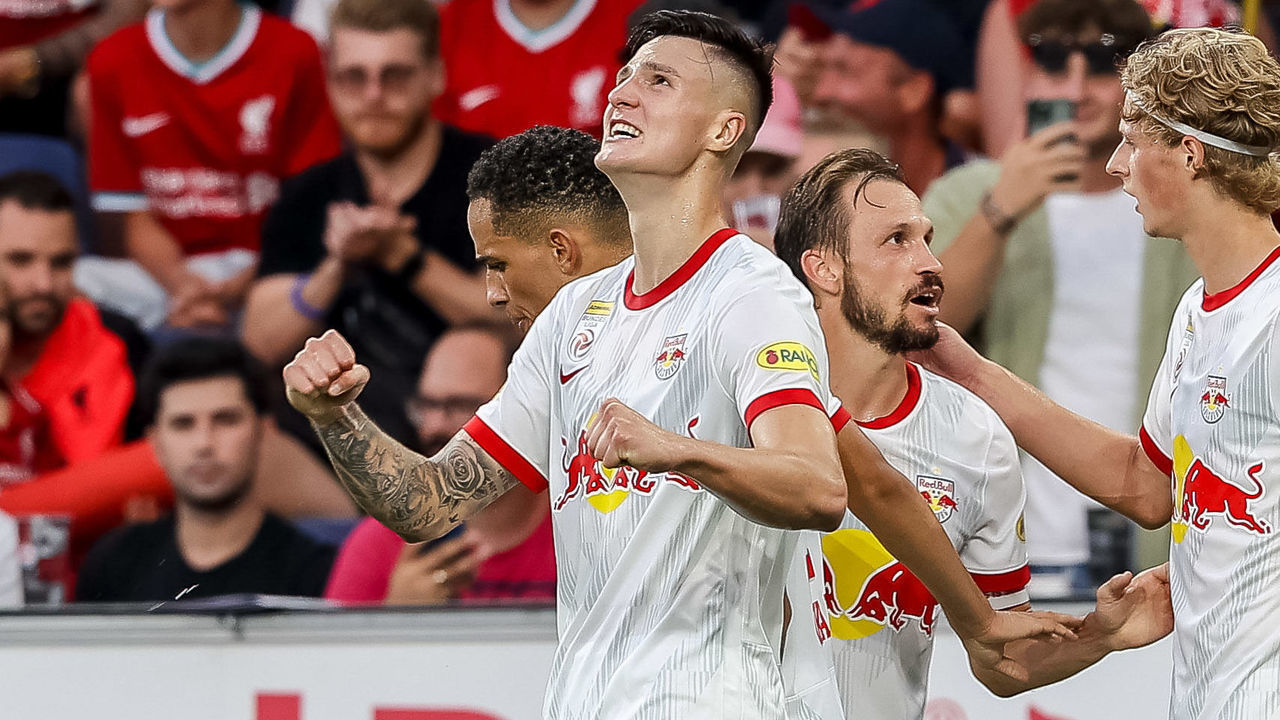 SALZBURG, AUSTRIA - JULY 27: Benjamin Sesko of Red Bull Salzburg celebrates after scoring his team's first goal with teammates during the pre-season friendly match between FC Red Bull Salzburg and FC Liverpool at Red Bull Arena on July 27, 2022 in Salzburg, Austria.