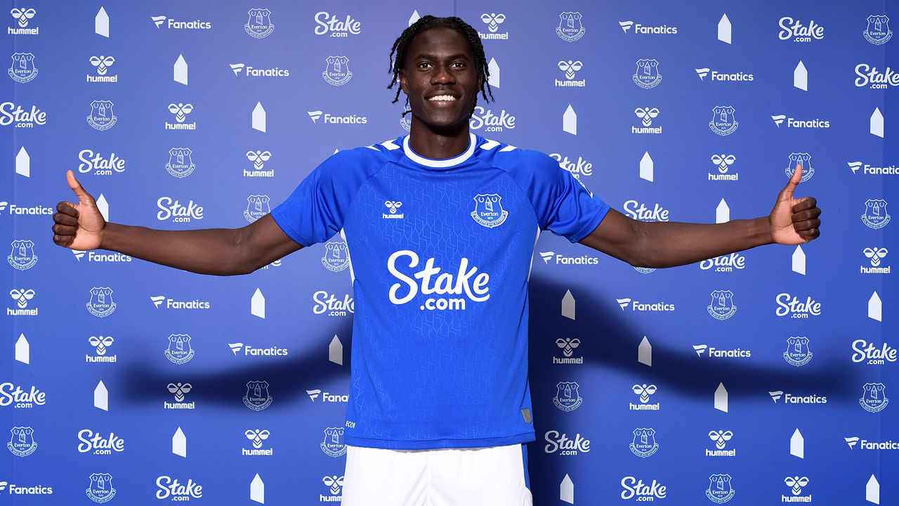 HALEWOOD, ENGLAND - AUGUST 09: (EXCLUSIVE COVERAGE) Amadou Onana poses for a photograph after signing for Everton at Finch Farm on August 09 2022 in Halewood, England.