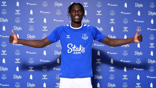 HALEWOOD, ENGLAND - AUGUST 09: (EXCLUSIVE COVERAGE) Amadou Onana poses for a photograph after signing for Everton at Finch Farm on August 09 2022 in Halewood, England.