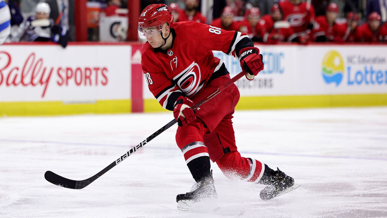 RALEIGH, NC - APRIL 21: Martin Necas #88 of the Carolina Hurricanes shoots the puck during an NHL game against the Winnipeg Jets on April 21, 2022 at PNC Arena in Raleigh, North Carolina.
