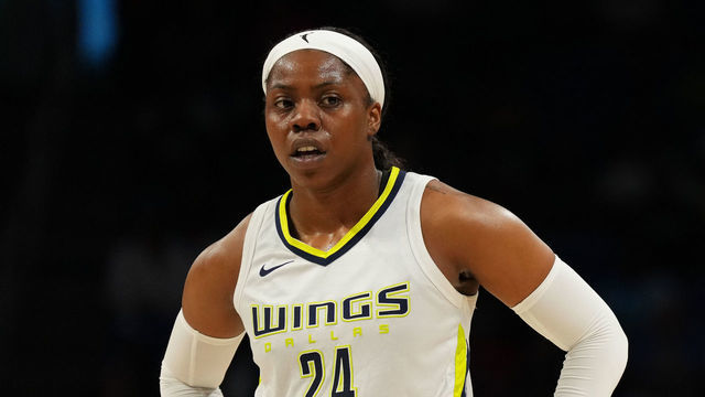 ARLINGTON, TX - JULY 28: Arike Ogunbowale #24 of the Dallas Wings looks on during the game against the Washington Mystics on July 28, 2022 at the College Park Center in Arlington, Texas. NOTE TO USER: User expressly acknowledges and agrees that, by downloading and/or using this Photograph, user is consenting to the terms and conditions of the Getty Images License Agreement. Mandatory Copyright Notice: Copyright 2022 NBAE