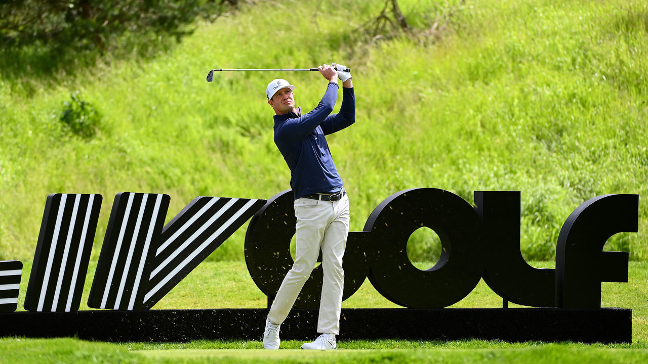 ST ALBANS, ENGLAND - JUNE 10: Hudson Swafford of Torque GC tees off on the 14th hole during day two of the LIV Golf Invitational - London at The Centurion Club on June 10, 2022 in St Albans, England.