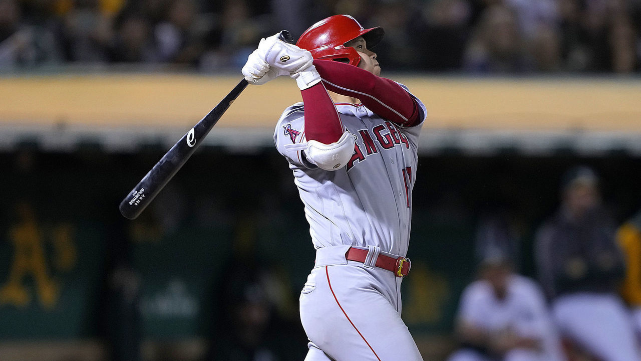 OAKLAND, CALIFORNIA - AUGUST 09: Shohei Ohtani #17 of the Los Angeles Angels hits a solo home run against the Oakland Athletics in the top of the seventh inning at RingCentral Coliseum on August 09, 2022 in Oakland, California.