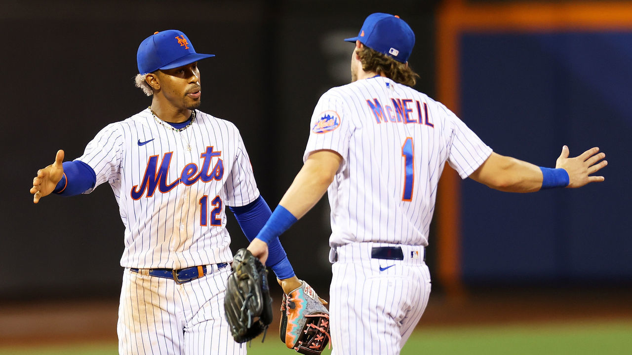 NEW YORK, NEW YORK - AUGUST 08: Francisco Lindor #12 and Jeff McNeil #1 of the New York Mets celebrate a 5-1 win over the Cincinnati Reds at Citi Field on August 08, 2022 in New York City.