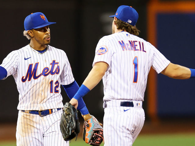 NEW YORK, NEW YORK - AUGUST 08: Francisco Lindor #12 and Jeff McNeil #1 of the New York Mets celebrate a 5-1 win over the Cincinnati Reds at Citi Field on August 08, 2022 in New York City.