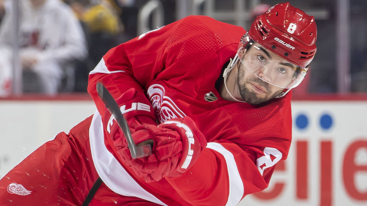 DETROIT, MI - APRIL 05: Jake Walman (8) of the Detroit Red Wings shoots the puck against the Boston Bruins during the first period of an NHL game at Little Caesars Arena on April 5, 2022 in Detroit, Michigan. Detroit defeated Boston 5-3.