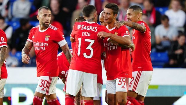 Benfica's Henrique Araujo (2nd R) celebrates scoring his team's second goal during the UEFA Champions League third qualifying round second leg football match between FC Midtjylland and SL Benfica in Herning, Denmark, on August 9, 2022. - Denmark OUT