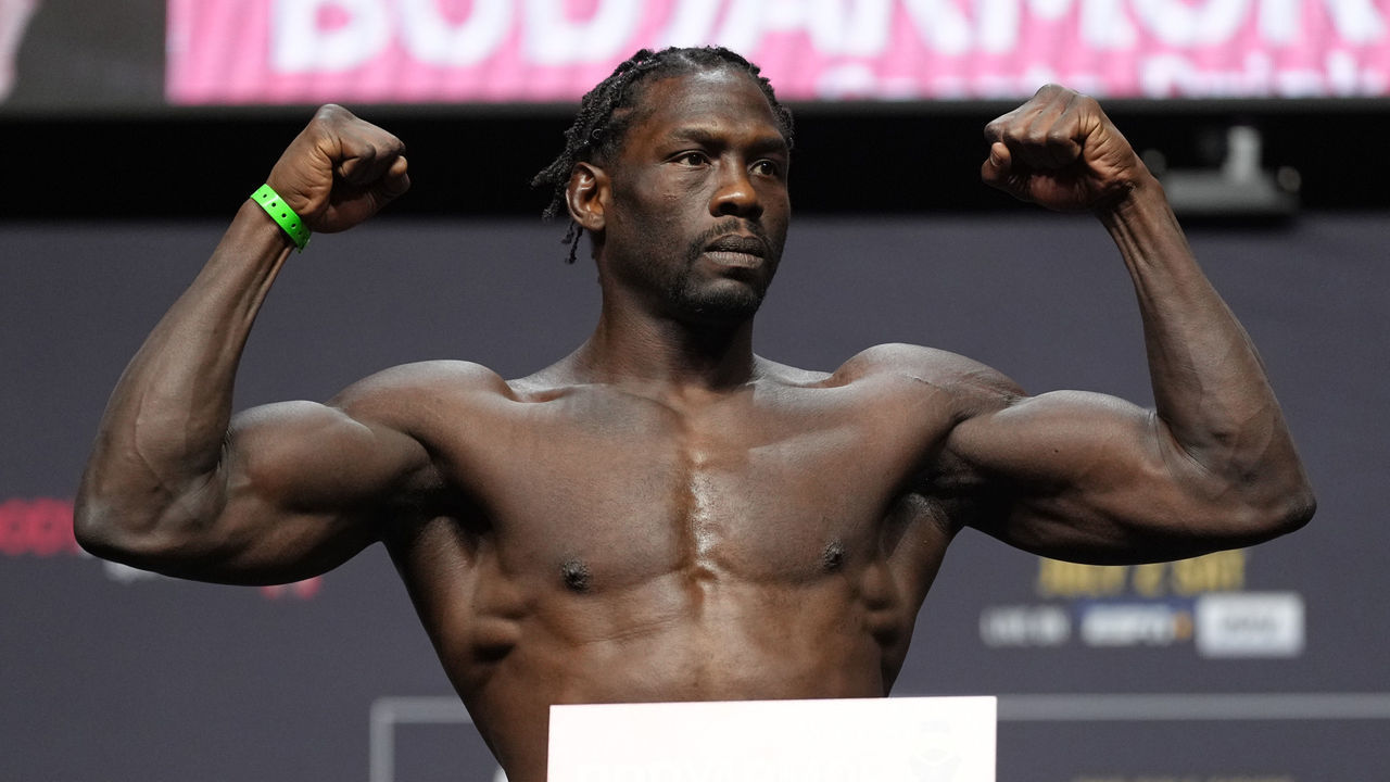 LAS VEGAS, NEVADA - JULY 01: Jared Cannonier poses on the scale during the UFC 276 ceremonial weigh-in at T-Mobile Arena on July 01, 2022 in Las Vegas, Nevada.