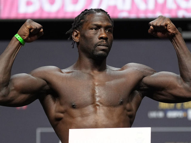 LAS VEGAS, NEVADA - JULY 01: Jared Cannonier poses on the scale during the UFC 276 ceremonial weigh-in at T-Mobile Arena on July 01, 2022 in Las Vegas, Nevada.