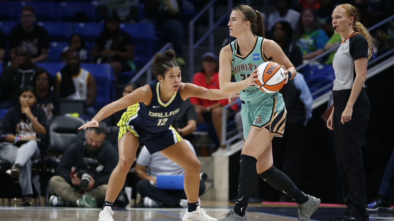 ARLINGTON, TX - AUGUST 10: Sabrina Ionescu #20 of the New York Liberty handles the ball during the game against the Dallas Wings on August 10, 2022 at the College Park Center in Arlington, Texas. NOTE TO USER: User expressly acknowledges and agrees that, by downloading and/or using this Photograph, user is consenting to the terms and conditions of the Getty Images License Agreement. Mandatory Copyright Notice: Copyright 2022 NBAE