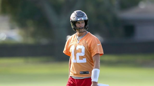 TAMPA, FL - AUG 09: Tampa Bay Buccaneers quarterback Tom Brady (12) looks over towards the special teams drills during the Tampa Bay Buccaneers Training Camp on August 09, 2022 at the AdventHealth Training Center at One Buccaneer Place in Tampa, Florida.