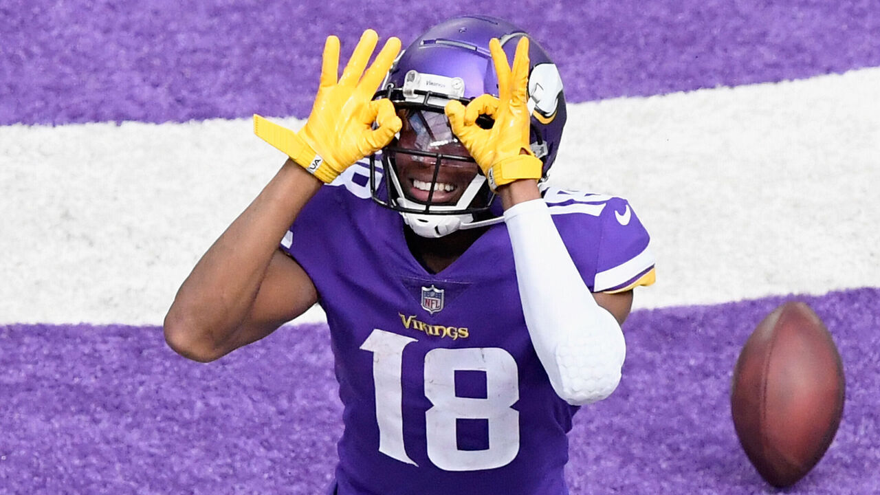 MINNEAPOLIS, MINNESOTA - SEPTEMBER 27: Justin Jefferson #18 of the Minnesota Vikings celebrates a touchdown against the Tennessee Titans during the third quarter of the game at U.S. Bank Stadium on September 27, 2020 in Minneapolis, Minnesota.