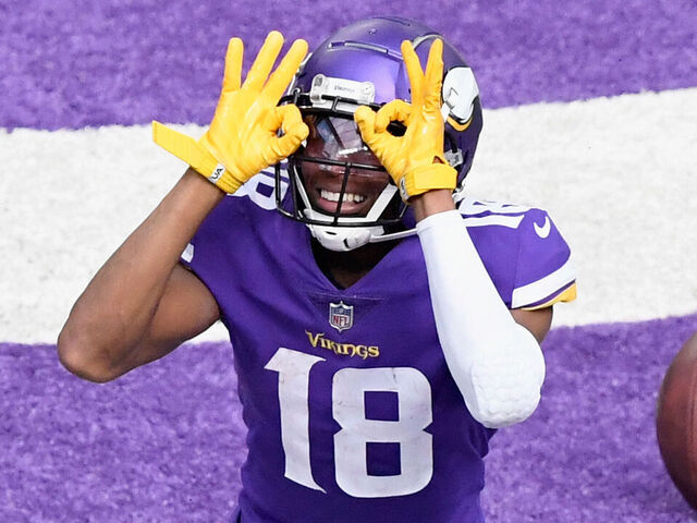MINNEAPOLIS, MINNESOTA - SEPTEMBER 27: Justin Jefferson #18 of the Minnesota Vikings celebrates a touchdown against the Tennessee Titans during the third quarter of the game at U.S. Bank Stadium on September 27, 2020 in Minneapolis, Minnesota.