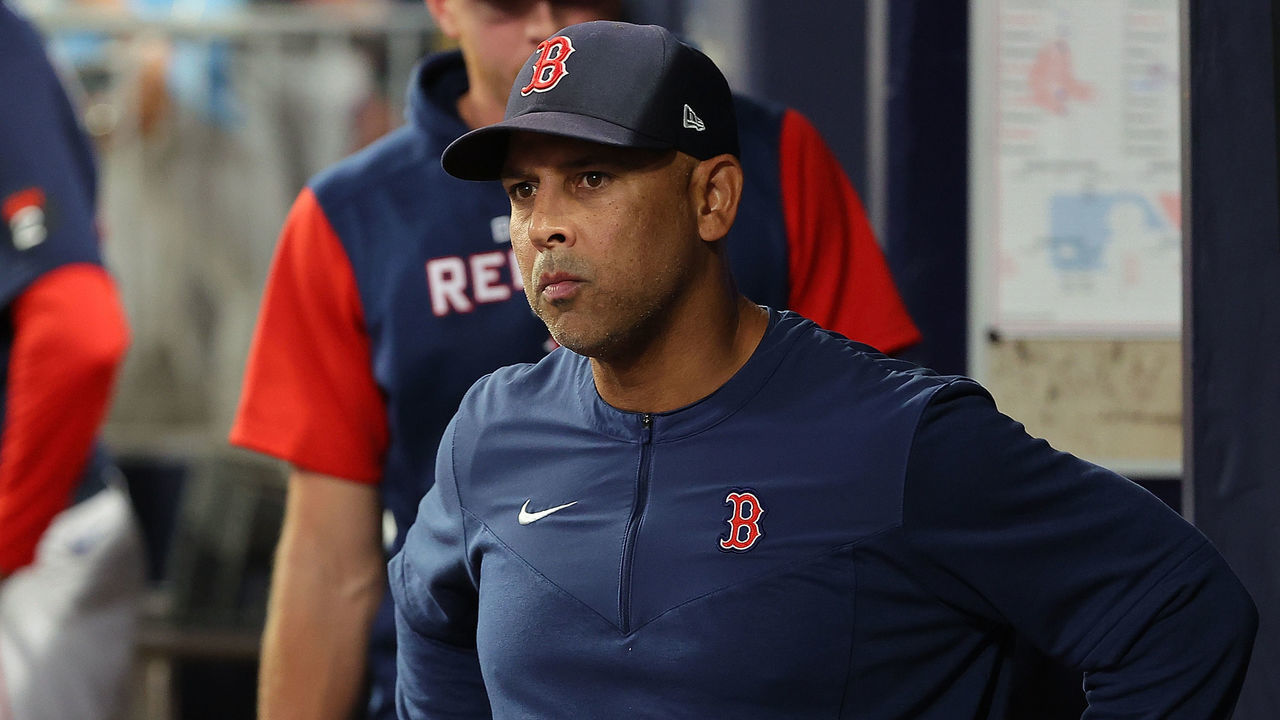 ATLANTA, GEORGIA - MAY 11: Manager Alex Cora #13 of the Boston Red Sox reacts in the dugout after being ejected by homeplate umpire Adam Beck #102 in the sixth inning shortly after an ejection of Kevin Plawecki #25 against the Atlanta Braves at Truist Park on May 11, 2022 in Atlanta, Georgia.