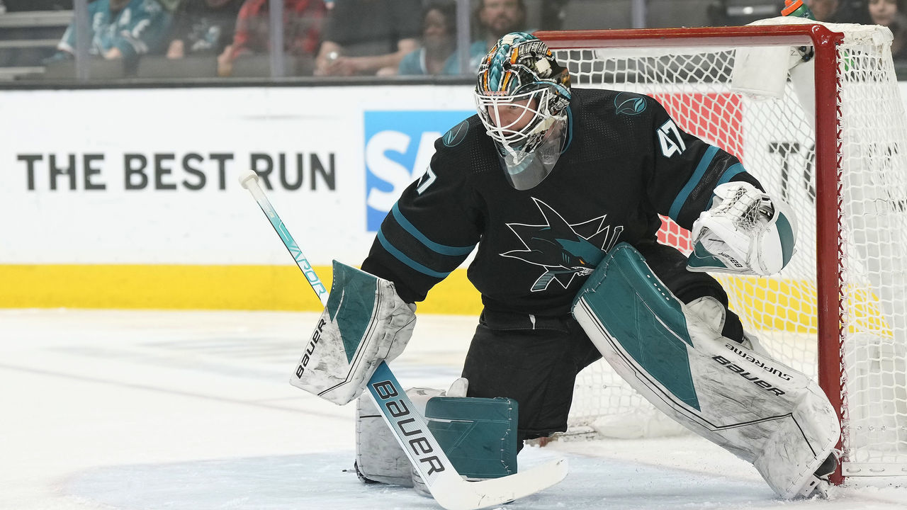 SAN JOSE, CALIFORNIA - APRIL 07: Goal Keeper James Reimer #47 of the San Jose Sharks defends his goal against the Calgary Flames during the first period of an NHL hockey game at SAP Center on April 07, 2022 in San Jose, California.