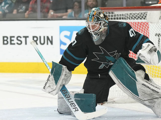 SAN JOSE, CALIFORNIA - APRIL 07: Goal Keeper James Reimer #47 of the San Jose Sharks defends his goal against the Calgary Flames during the first period of an NHL hockey game at SAP Center on April 07, 2022 in San Jose, California.