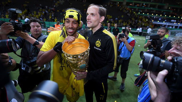 BERLIN, GERMANY - MAY 27: Pierre-Emerick Aubameyang and Thomas Tuchel of Dortmund look on with the trophy after winning the DFB Cup Final 2017 between Eintracht Frankfurt and Borussia Dortmund at Olympiastadion on May 27, 2017 in Berlin, Germany..