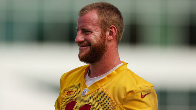 ASHBURN, VA - JUNE 16: Carson Wentz #11 of the Washington Commanders looks on during the organized team activity at INOVA Sports Performance Center on June 16, 2022 in Ashburn, Virginia.