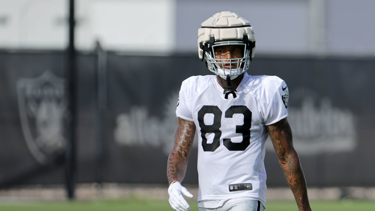 HENDERSON, NEVADA - JULY 27: Tight end Darren Waller #83 of the Las Vegas Raiders walks on a field during the team's first fully padded practice during training camp at the Las Vegas Raiders Headquarters/Intermountain Healthcare Performance Center on July 27, 2022 in Henderson, Nevada.