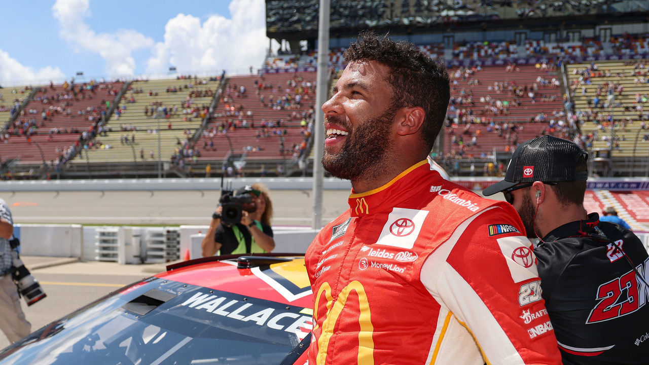 BROOKLYN, MICHIGAN - AUGUST 06: Bubba Wallace, driver of the #23 McDonald's Toyota, celebrates after winning the pole award for the NASCAR Cup Series FireKeepers Casino 400 at Michigan International Speedway on August 06, 2022 in Brooklyn, Michigan.