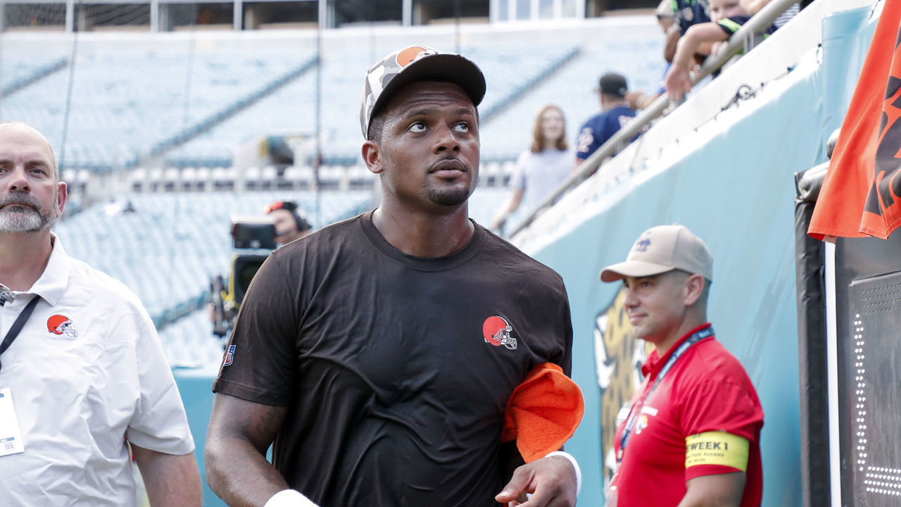 JACKSONVILLE, FL - AUGUST 12: Quarterback Deshaun Watson #4 of the Cleveland Browns talk with fans before the start of a preseason game against the Jacksonville Jaguars at TIAA Bank Field on August 12, 2022 in Jacksonville, Florida.