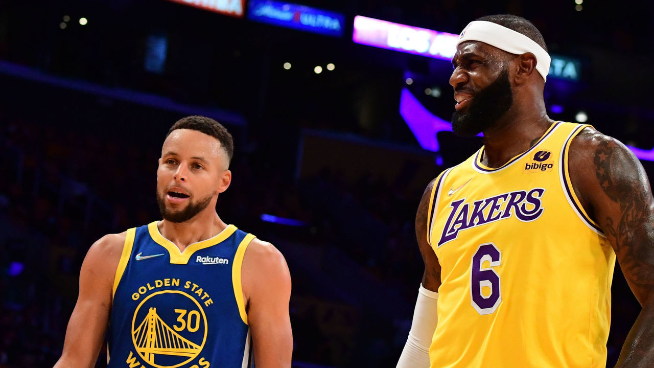 LOS ANGELES, CA - OCTOBER 19: Stephen Curry #30 of the Golden State Warriors and LeBron James #6 of the Los Angeles Lakers talk during the game on October 19, 2021 at STAPLES Center in Los Angeles, California. NOTE TO USER: User expressly acknowledges and agrees that, by downloading and/or using this Photograph, user is consenting to the terms and conditions of the Getty Images License Agreement. Mandatory Copyright Notice: Copyright 2021 NBAE