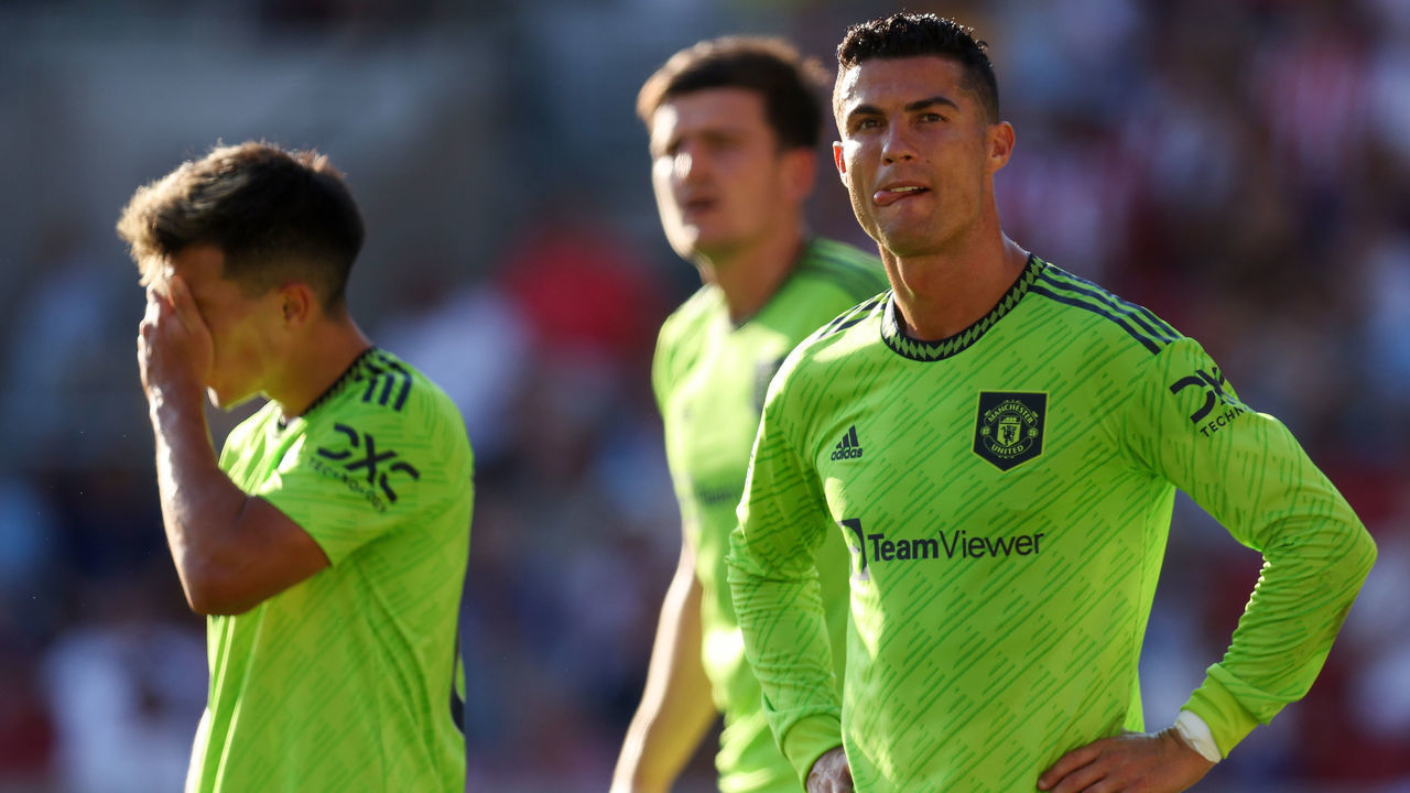 BRENTFORD, ENGLAND - AUGUST 13: Cristiano Ronaldo and Lisandro Martinez of Manchester United look dejected during the Premier League match between Brentford FC and Manchester United at Brentford Community Stadium on August 13, 2022 in Brentford, England.