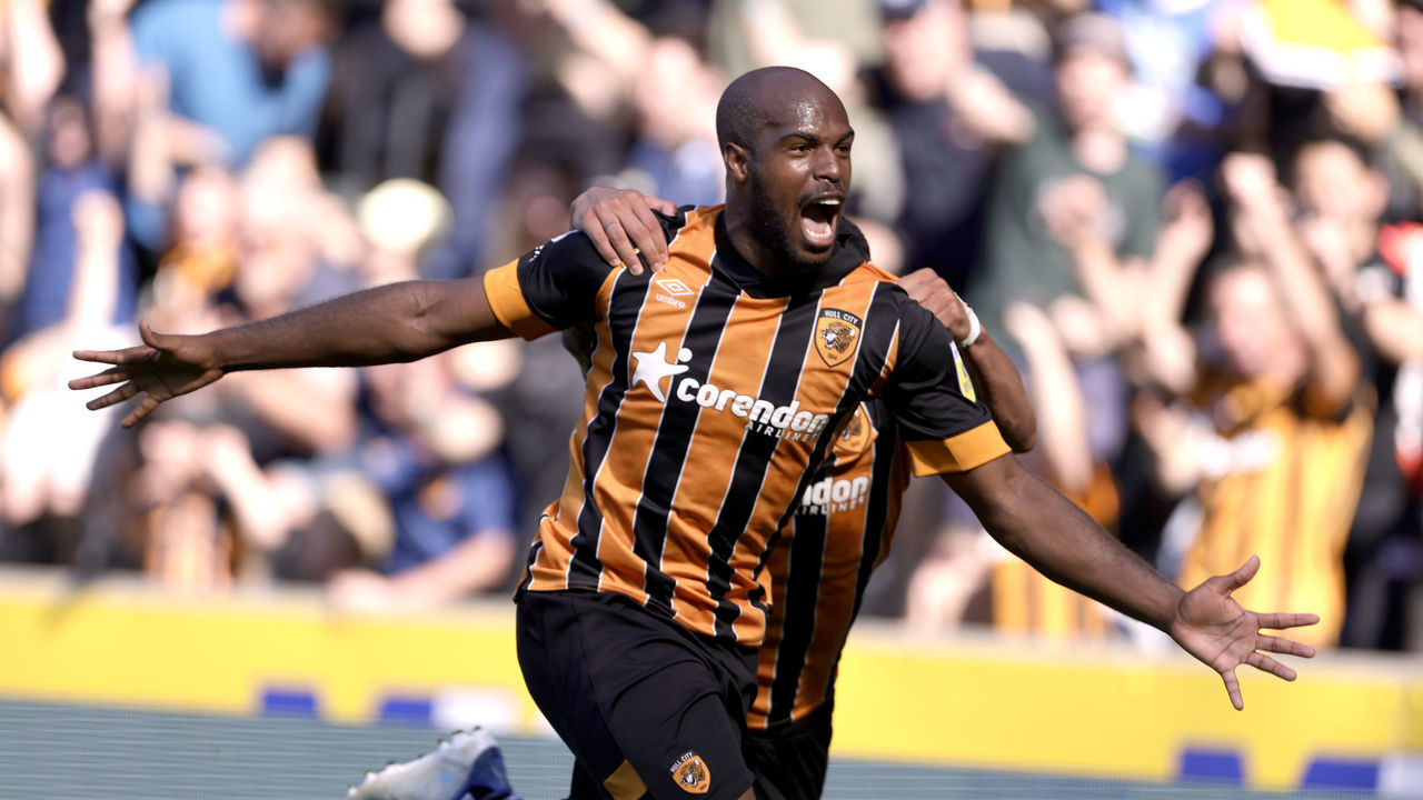 Hull City's Oscar Estupinan celebrates scoring their side's second goal of the game with team-mate Allahyar Sayyadmanesh during the Sky Bet Championship match at the MKM Stadium, Hull. Picture date: Saturday August 13, 2022.