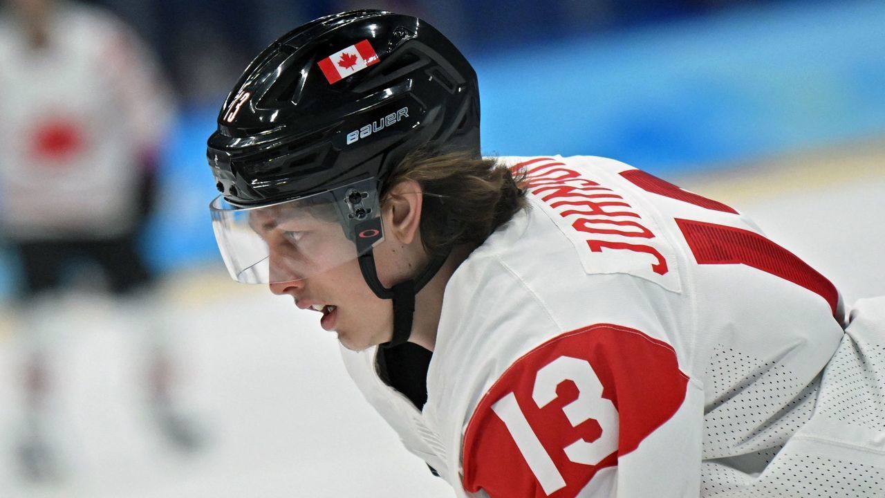 Canada's Kent Johnson skates after scoring the team's fourth goal against China during their men's preliminary round group A match of the Beijing 2022 Winter Olympic Games ice hockey competition, at the National Indoor Stadium in Beijing on February 13, 2022.