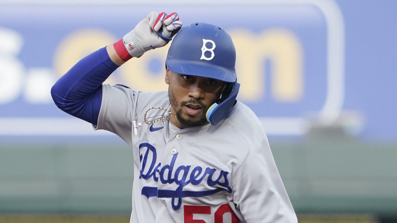 KANSAS CITY, MISSOURI - AUGUST 13: Mookie Betts #50 of the Los Angeles Dodgers celebrates his home run in the first inning against the Kansas City Royals at Kauffman Stadium on August 13, 2022 in Kansas City, Missouri.