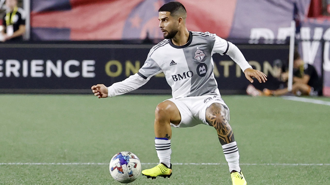 FOXBOROUGH, MA - JULY 30: Toronto FC forward Lorenzo Insigne (24) cuts back during a match between the New England Revolution and Toronto FC on July 30, 2022, at Gillette Stadium in Foxborough, Massachusetts.