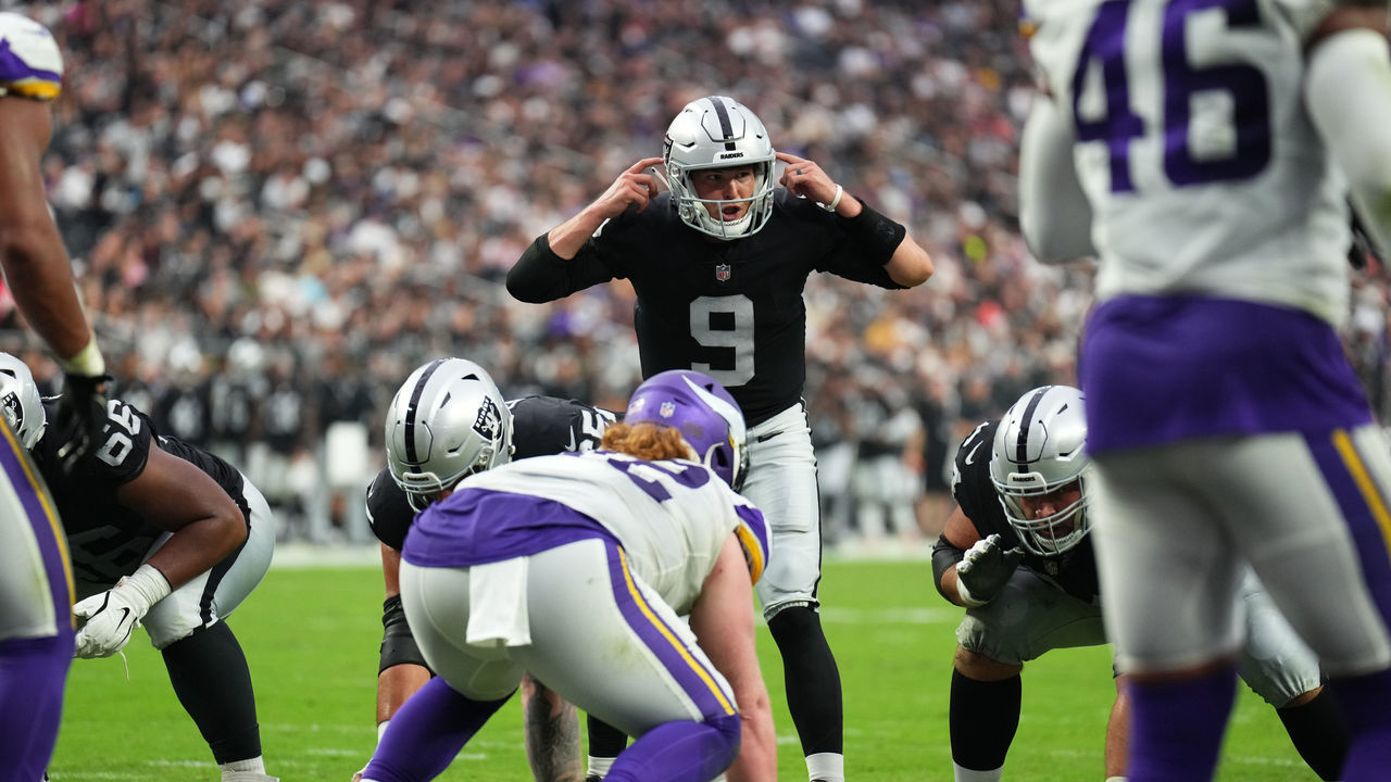 LAS VEGAS, NEVADA - AUGUST 14: Quarterback Nick Mullens #9 of the Las Vegas Raiders signals at the line of scrimmage during the second half of a preseason game against the Minnesota Vikings at Allegiant Stadium on August 14, 2022 in Las Vegas, Nevada.