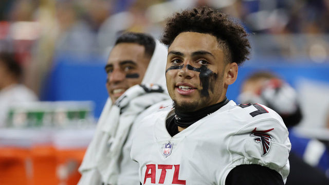 DETROIT, MICHIGAN - AUGUST 12: Drake London #5 of the Atlanta Falcons looks on from the sideline next to Marcus Mariota #1 of the Atlanta Falcons while playing the Detroit Lions during a NFL preseason game at Ford Field on August 12, 2022 in Detroit, Michigan.