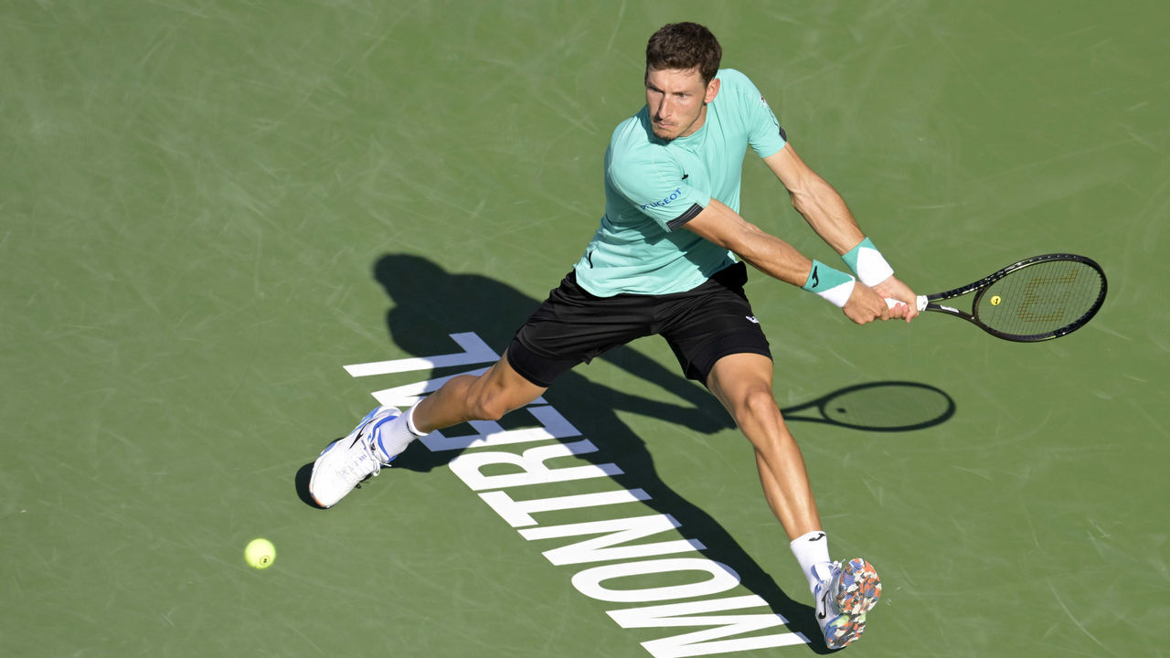 MONTREAL, QC - AUGUST 14: Pablo Carreno Busta (ESP) returns a ball during the mens final vs. opponent Hubert Hurkacz (POL) at National Bank Open at Stade IGA on August 14, 2022 in Montreal, Canada.