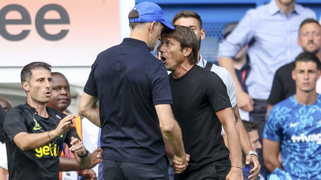 LONDON, ENGLAND - AUGUST 14: Head Coachs' Antonio Conte of Tottenham Hotspur and Thomas Tuchel of Chelsea had to be pulled apart at the end of their sides 2-2 draw and both received red cards from Referee Anthony Taylor during the Premier League match between Chelsea FC and Tottenham Hotspur at Stamford Bridge on August 14, 2022 in London, England.