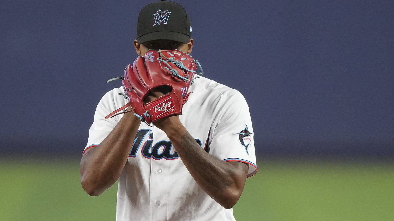 MIAMI, FLORIDA - AUGUST 03: Sandy Alcantara #22 of the Miami Marlins prepares to throw a pitch during the first inning against the Cincinnati Reds at loanDepot park on August 03, 2022 in Miami, Florida.