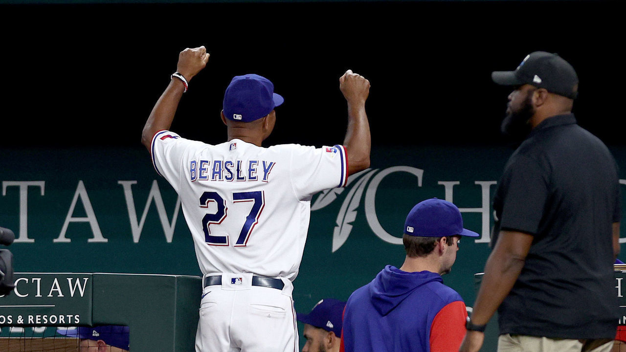 ARLINGTON, TEXAS - AUGUST 15: Interim Manager Tony Beasley #27 of the Texas Rangers celebrates after the Rangers beat the Oakland Athletics 2-1 at Globe Life Field on August 15, 2022 in Arlington, Texas.