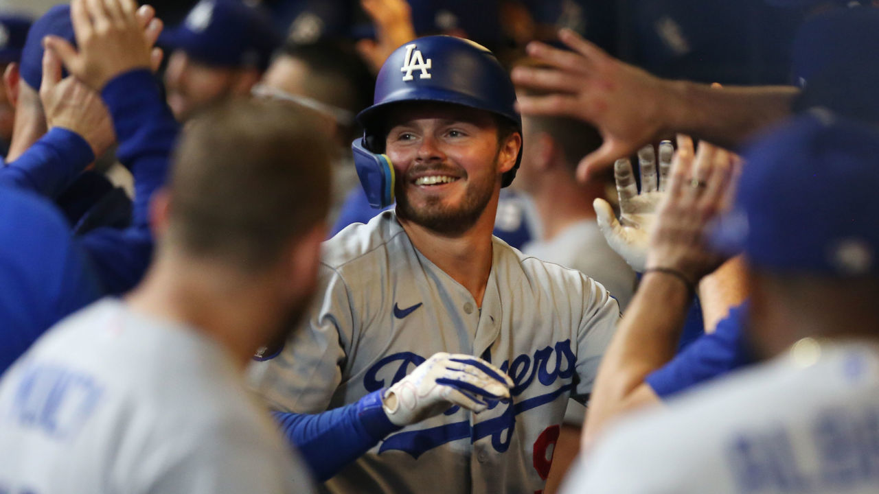MILWAUKEE, WI - AUGUST 15: Los Angeles Dodgers second baseman Gavin Lux (9) celebrates his home run with his teammates during a game between the Milwaukee Brewers and the Los Angeles Dodgers at American Family Field on August 15, 2022 in Milwaukee, WI.