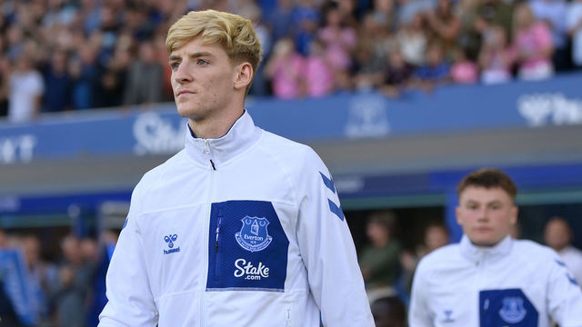 LIVERPOOL, ENGLAND - AUGUST 06: Anthony Gordon walks out for the Premier League match between Everton and Chelsea at Goodison Park on August 06, 2022 in Liverpool, England.