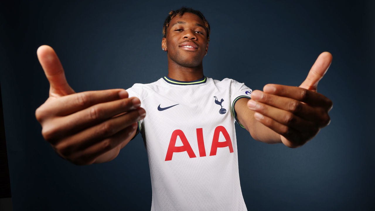 ENFIELD, ENGLAND - AUGUST 15: Tottenham Hotspur new signing Destiny Udogie poses for a photo at Tottenham Hotspur Training Centre on August 15, 2022 in Enfield, England.