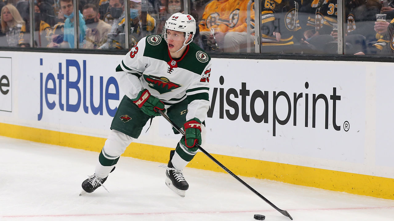 BOSTON, MA - JANUARY 06: Minnesota Wild center Marco Rossi (23) skates with the puck during the NHL game between Minnesota Wild and Boston Bruins on January 6, 2022, at TD Garden in Boston, MA.