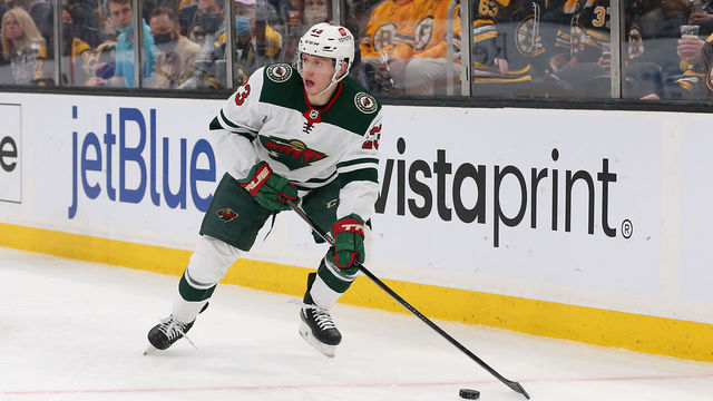 BOSTON, MA - JANUARY 06: Minnesota Wild center Marco Rossi (23) skates with the puck during the NHL game between Minnesota Wild and Boston Bruins on January 6, 2022, at TD Garden in Boston, MA.