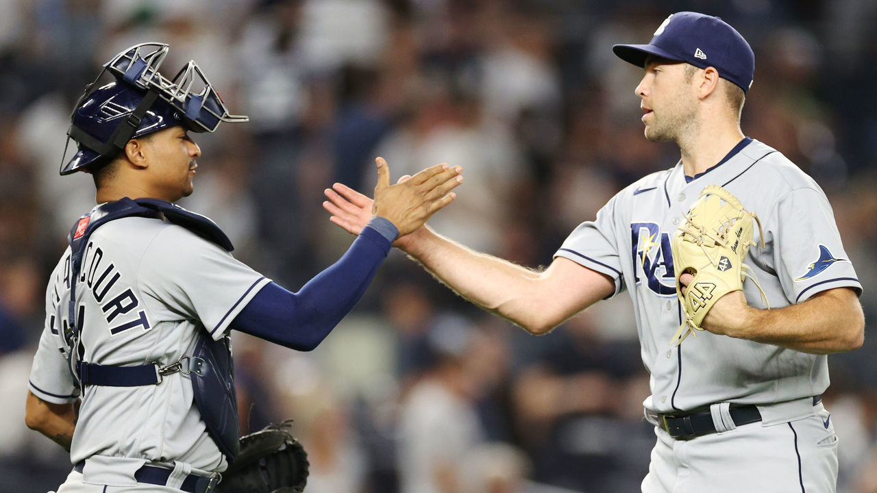 NEW YORK, NEW YORK - AUGUST 16: Christian Bethancourt #14 celebrates with Jason Adam #47 of the Tampa Bay Rays during the ninth inning against the New York Yankees at Yankee Stadium on August 16, 2022 in the Bronx borough of New York City. The Rays won 3-1.