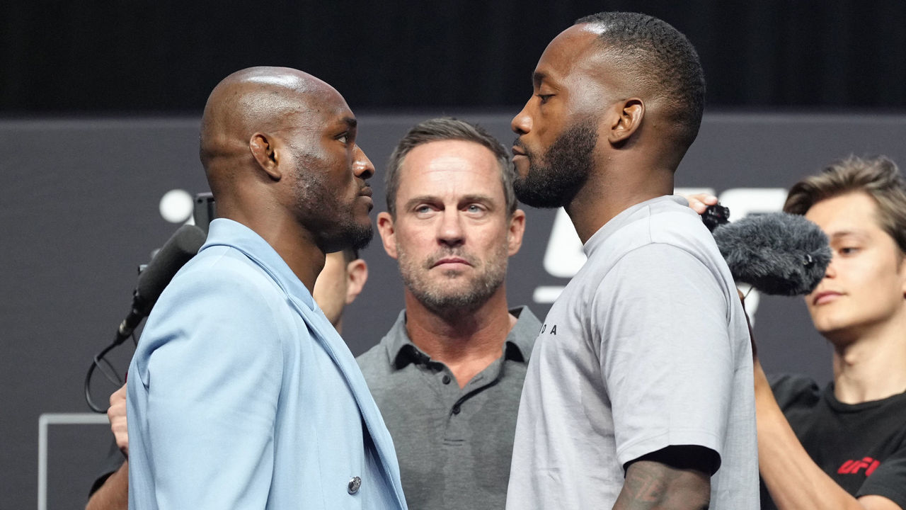LAS VEGAS, NEVADA - JULY 01: (L-R) Opponents Kamaru Usman and Leon Edwards face off during the UFC 276 ceremonial weigh-in at T-Mobile Arena on July 01, 2022 in Las Vegas, Nevada.