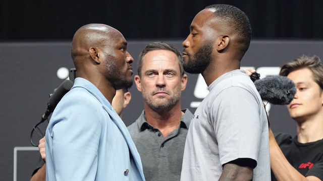 LAS VEGAS, NEVADA - JULY 01: (L-R) Opponents Kamaru Usman and Leon Edwards face off during the UFC 276 ceremonial weigh-in at T-Mobile Arena on July 01, 2022 in Las Vegas, Nevada.