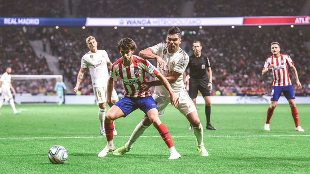 Joao Felix and Casemiro during La Liga match between Atletico de Madrid and Real Madrid at Wanda Metropolitano on September 28, 2019 in Madrid, Spain .