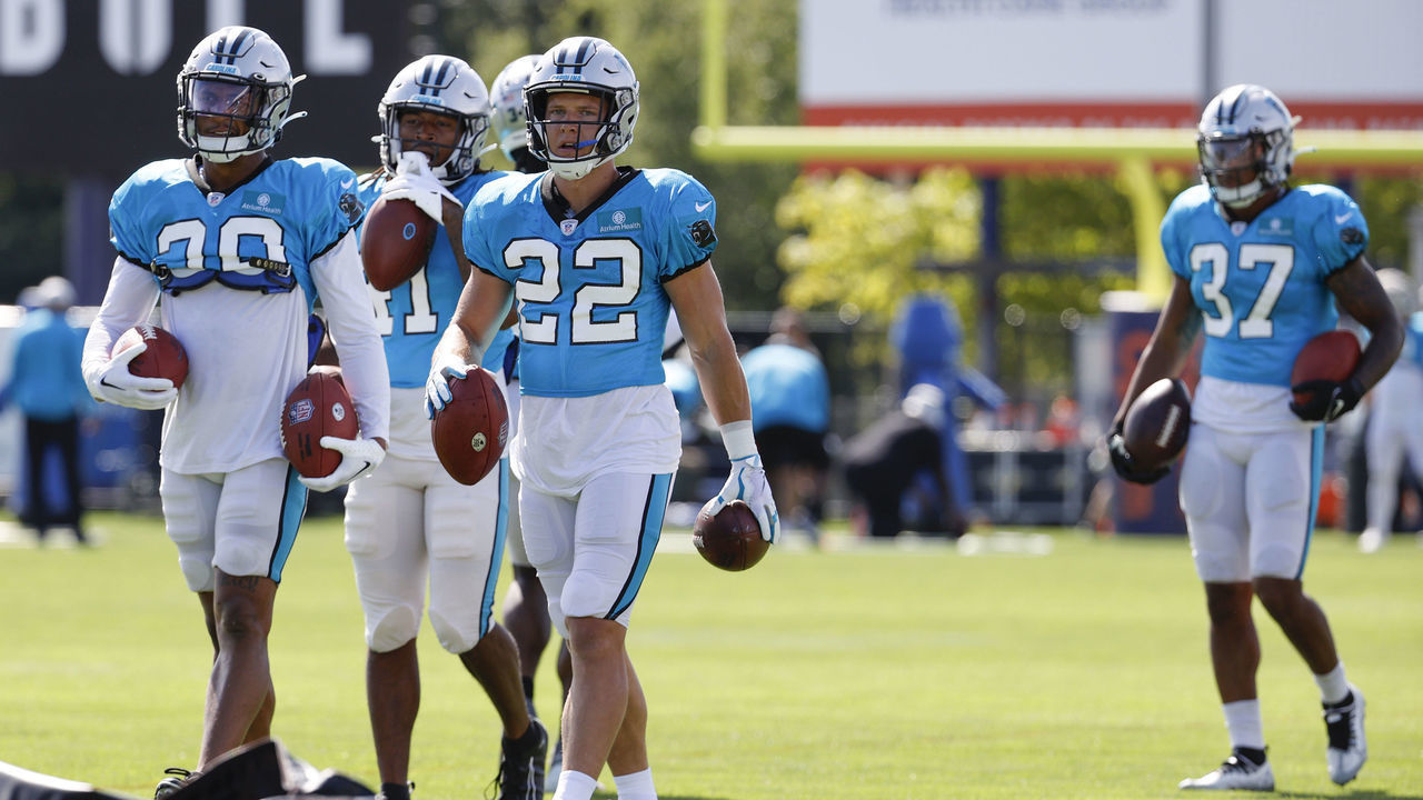 FOXBOROUGH, MA - AUGUST 16: Carolina Panthers running back Christian McCaffrey (22) and the running backs get set for a drill during a joint practice between the New England Patriots and the Carolina Panthers on August 16, 2022, at the Patriots Practice Facility at Gillette Stadium in Foxborough, Massachusetts.