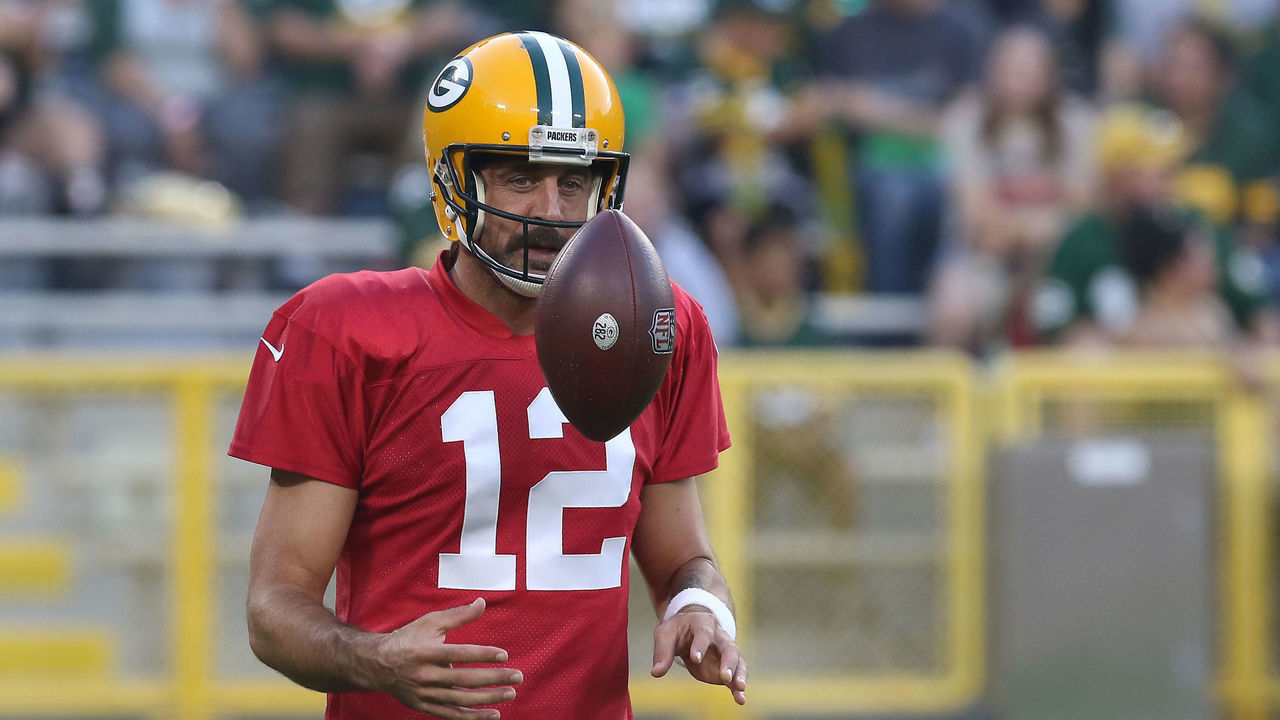 ASHWAUBENON, WI - AUGUST 05: Green Bay Packers quarterback Aaron Rodgers (12) flips a ball during Green Bay Packers Family Night at Lambeau Field, on August 5, 2022 in Green Bay, WI.