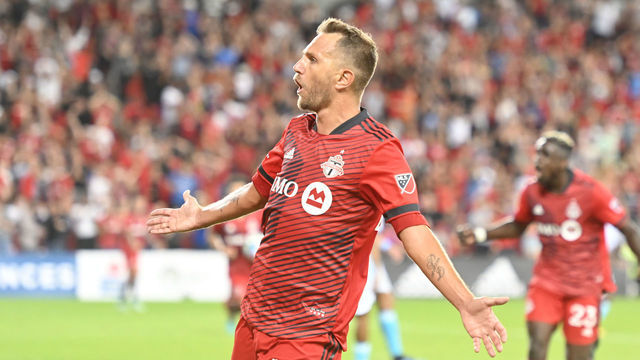 TORONTO, ON - AUGUST 17: Toronto FC defender Domenico Criscito (44) celebrates his first goal with Toronto FC during the MLS regular season game between the New England Revaluation and Toronto FC on August 17, 2022, at BMO Field in Toronto, ON, Canada.